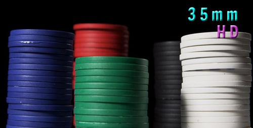 Stacks of Colorful Poker Chips on Black