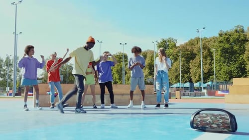 Diverse Friends Dancing Together in the Park
