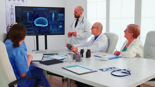 Doctors and Nurse Meeting About Medical Research
