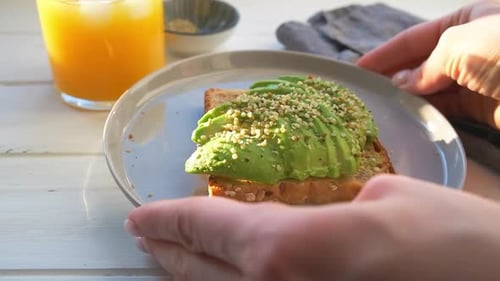 Avocado Toast on Plate Near Orange Juice