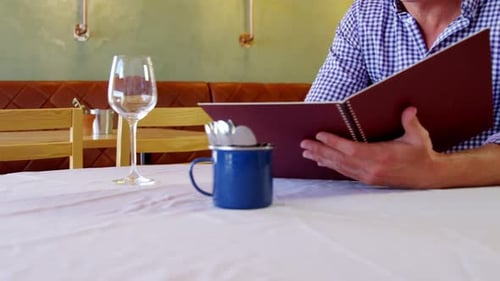 Man checking out the menu
