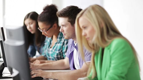 Students Making Computer Test At Informatics