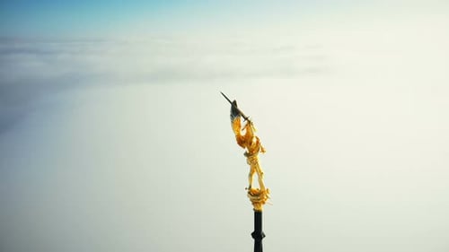 Super Close-up Aerial Shot, Golden St Michael Statue on Top of Mont Saint Michel Castle Fortress