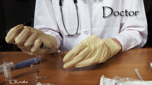 Medical Professional Preparing Injection in Lab