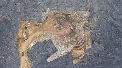 Aerial Top View Video of a Solid Waste Landfill. City Waste Treatment Location. Environmental