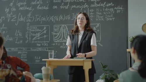Female Student Giving Speech at Lectern