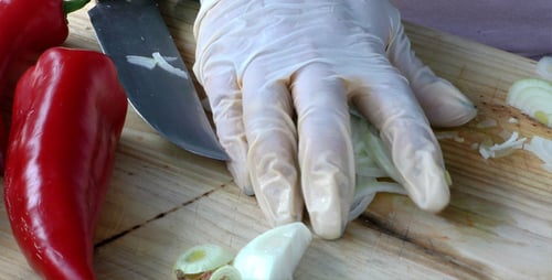 Chopping Onion on Wooden Plate 4