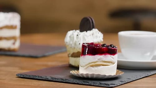 Close Up Shot on a Slice of Cake with Gelly and Fruits