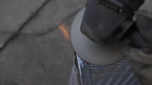 Powerful Machinery Grinding Metal Creates Sparks