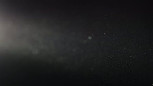 Abstract Particles Floating in Dark Space with Light