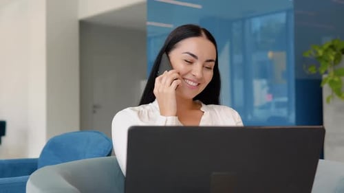 Young Business Girl Working with Laptop in Coffee Shop Cafe