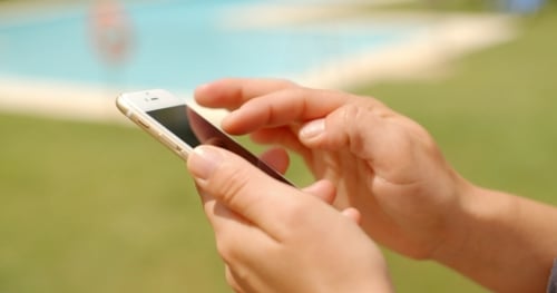 Close Up On Woman Hands While Using Mobile Phone