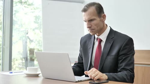 Businessman in Shock at Work