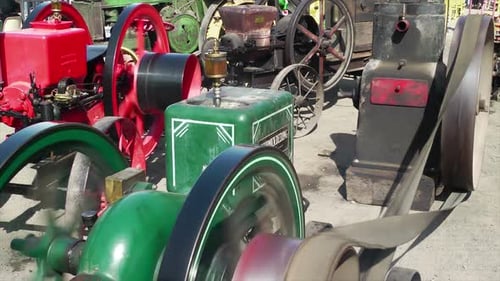Colorful Vintage Engines Running on Display