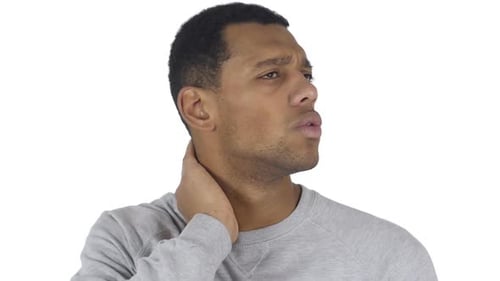 Man Massaging Stiff Neck in Close Up