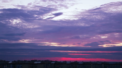 Evening Sky over the Roofs of the City