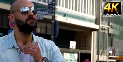 Man Wearing Glasses and City