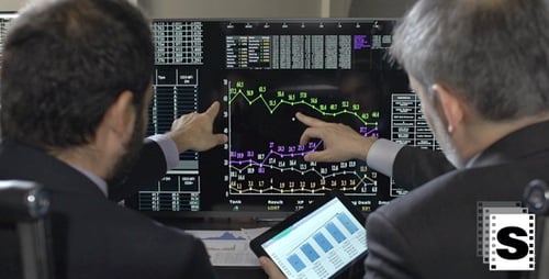 Traders Analysing Stock Market