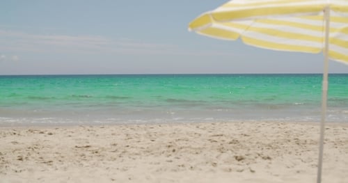 Beach Umbrella On a Sunny Tropical Beach
