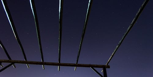 Night Sky Through Roof Terrace With Wooden Beams
