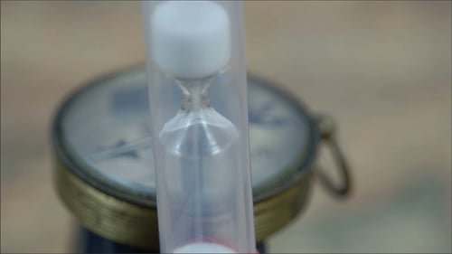 An Hourglass Slowly Dropping Sand