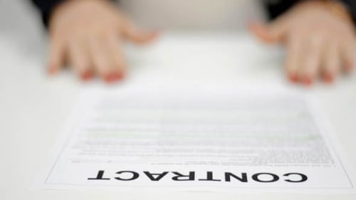 Contract on White Surface