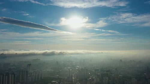 Fog morning at downtown district. Above the clouds.