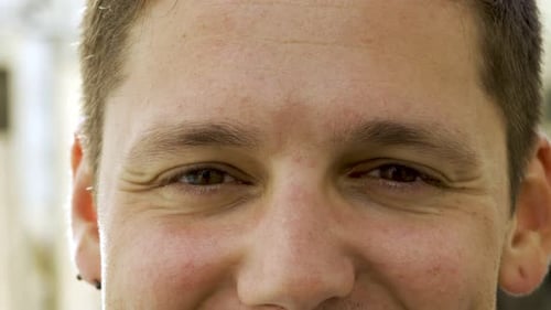 Extreme Close-Up of a Man's Smiling Face