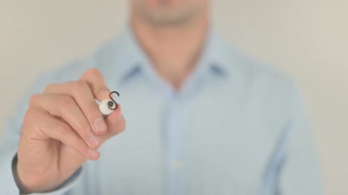 Writing Scholarship on Clear Surface with Marker