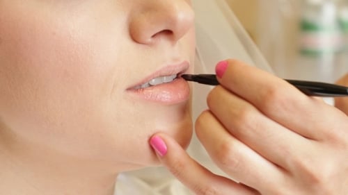 Rouging Bride'S Lips
