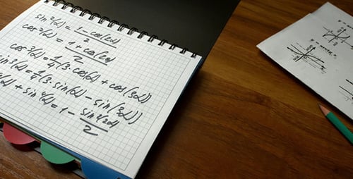 A Man Writes a Mathematical Formula in Notepad
