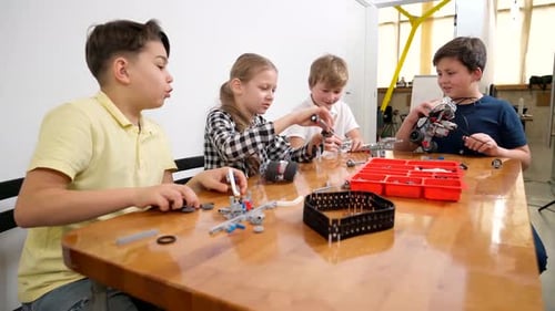 Creative Kids Using Building Kit.