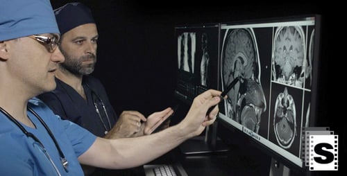 Surgeons Examinig Mri