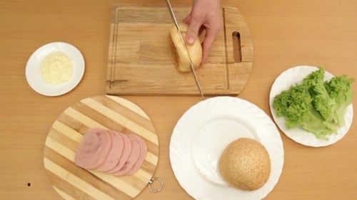 Preparing a Delicious Ham and Lettuce Sandwich