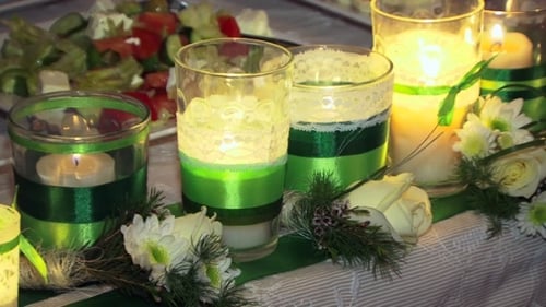 Candlelit Table with Flowers for Romantic Celebration