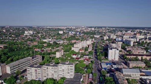 Drone Rises Above the Intersection of the Roads in a Suburb