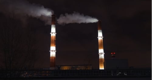 Smoking Factory Pipes In The City At Night