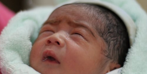 Precious Newborn Infant Sleeping Peacefully