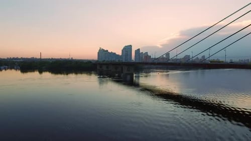 Hanging Bridge in City. Aerial View Evening City Landscape
