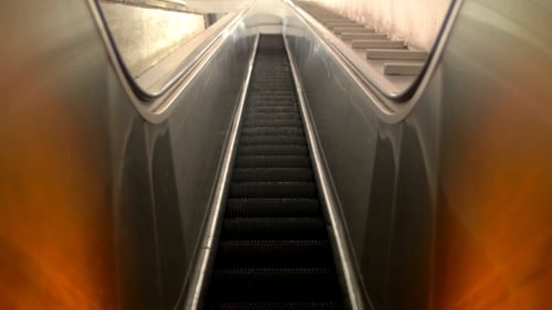 Escalator Moving Upwards in a Subway