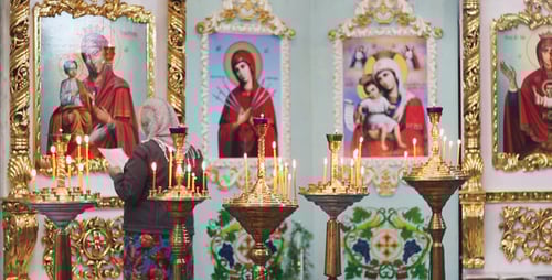 Woman Praying in Church