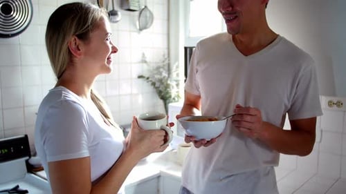 Happy couple having breakfast