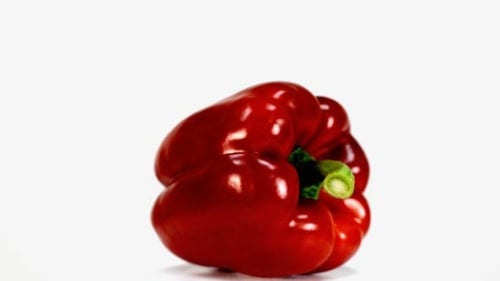 Rotating Red Bell Pepper on White Background