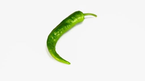 Rotating Thin Green Pepper