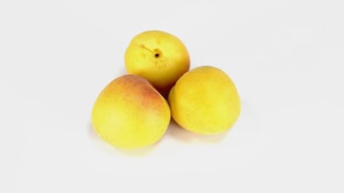 Fresh Apricots on White Background