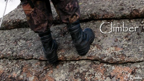 Climber On The Cliff