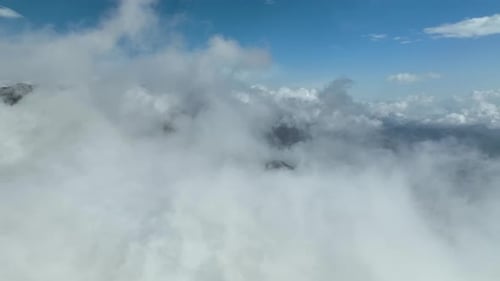 Cloudy landscape high in the mountains aerial view 4 K