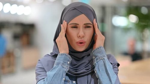 Woman Rubbing Temples Suffering Headache Pain