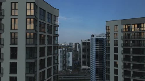 Construction of a modern city block. Multi-storey buildings