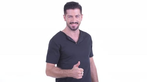 Man Smiling and Giving Thumbs Up on White